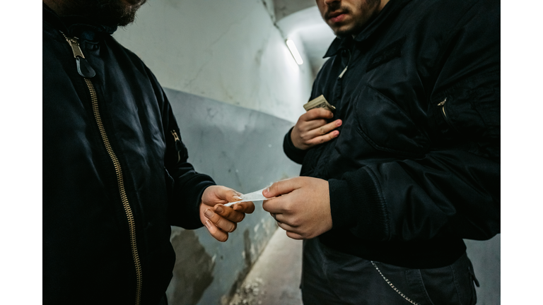 Man Buying Drugs On The Street