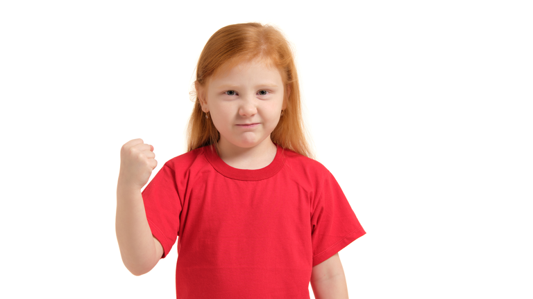 Close-up portrait mad young girl about to have nervous atomic breakdown, fist up in air, angry with someone isolated white background.