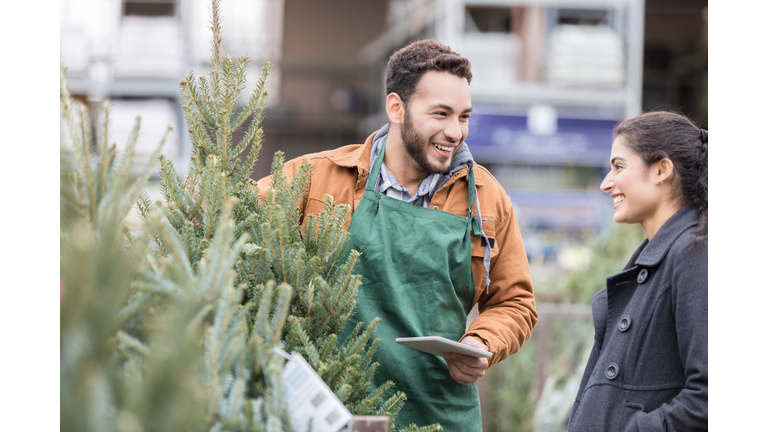 Christmas tree lot owner helps customer