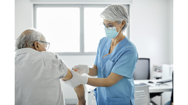 Nurse Injecting COVID-19 Vaccine.