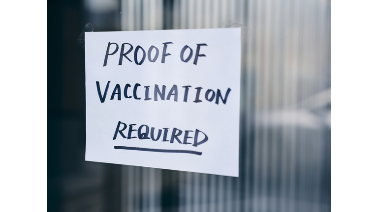 Business Wtih Vaccine Mandate Sign