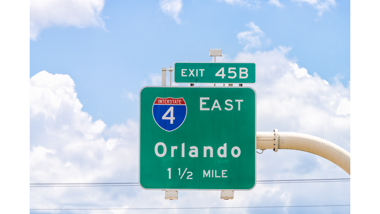 Tampa, USA road street interstate highway green arrow sign for i4 east exit for Orlando Florida with text closeup