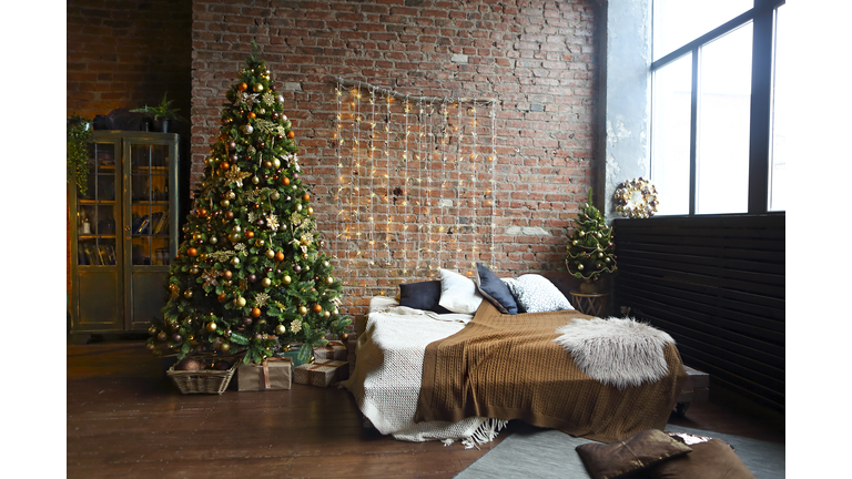 Christmas tree in the room in the loft