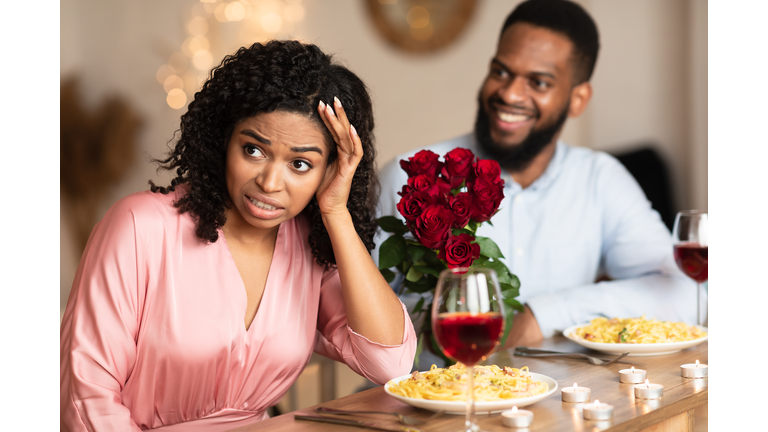 Black Woman On Unsuccessful First Date In Restaurant