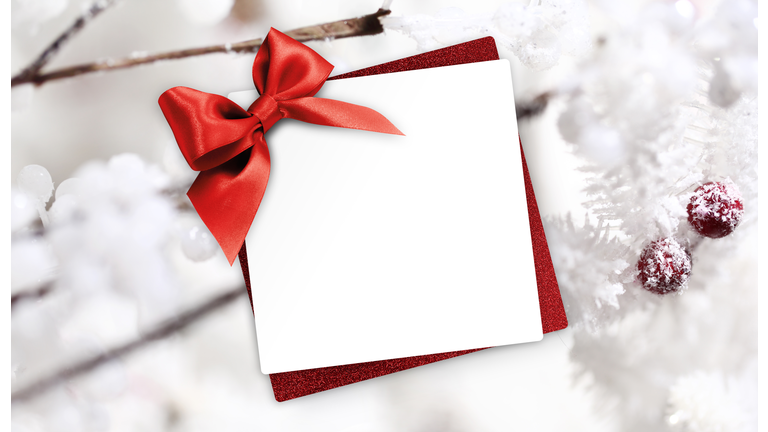 christmas greeting gift card with red ribbon bow and holly berries background white template copy space