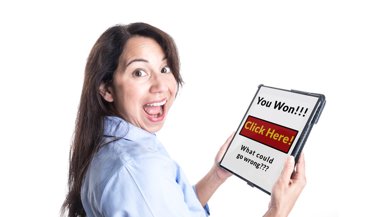 Young Woman Reacts Happily to Winning Prize on her Tablet.