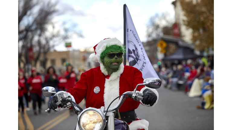 Man wearing a Grinch Mask