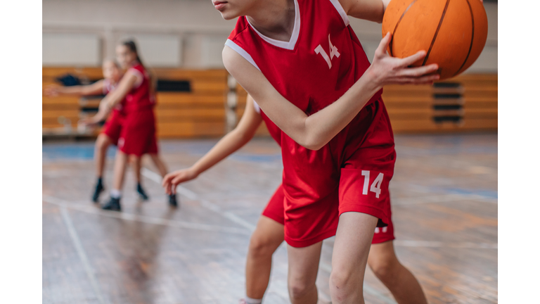 Girls playing basketball