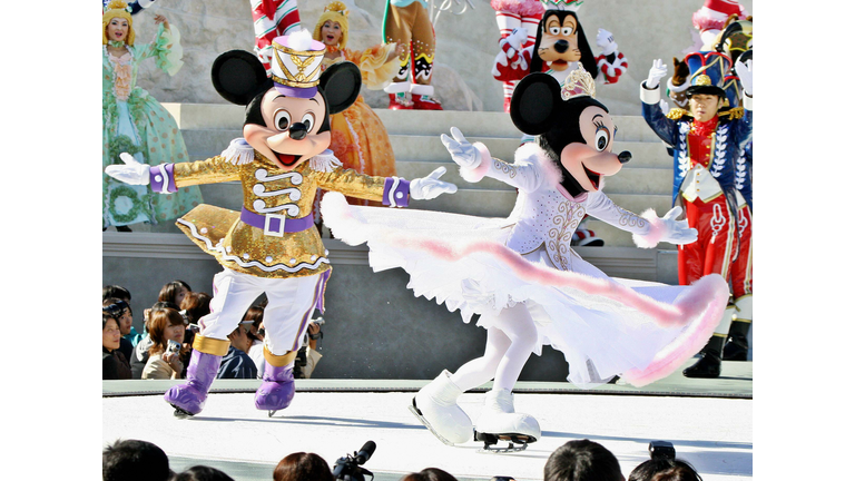 Disney characters Mickey (L) and Minnie