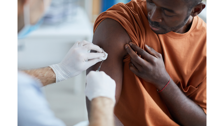 African Man Vaccinating against Covid Close Up