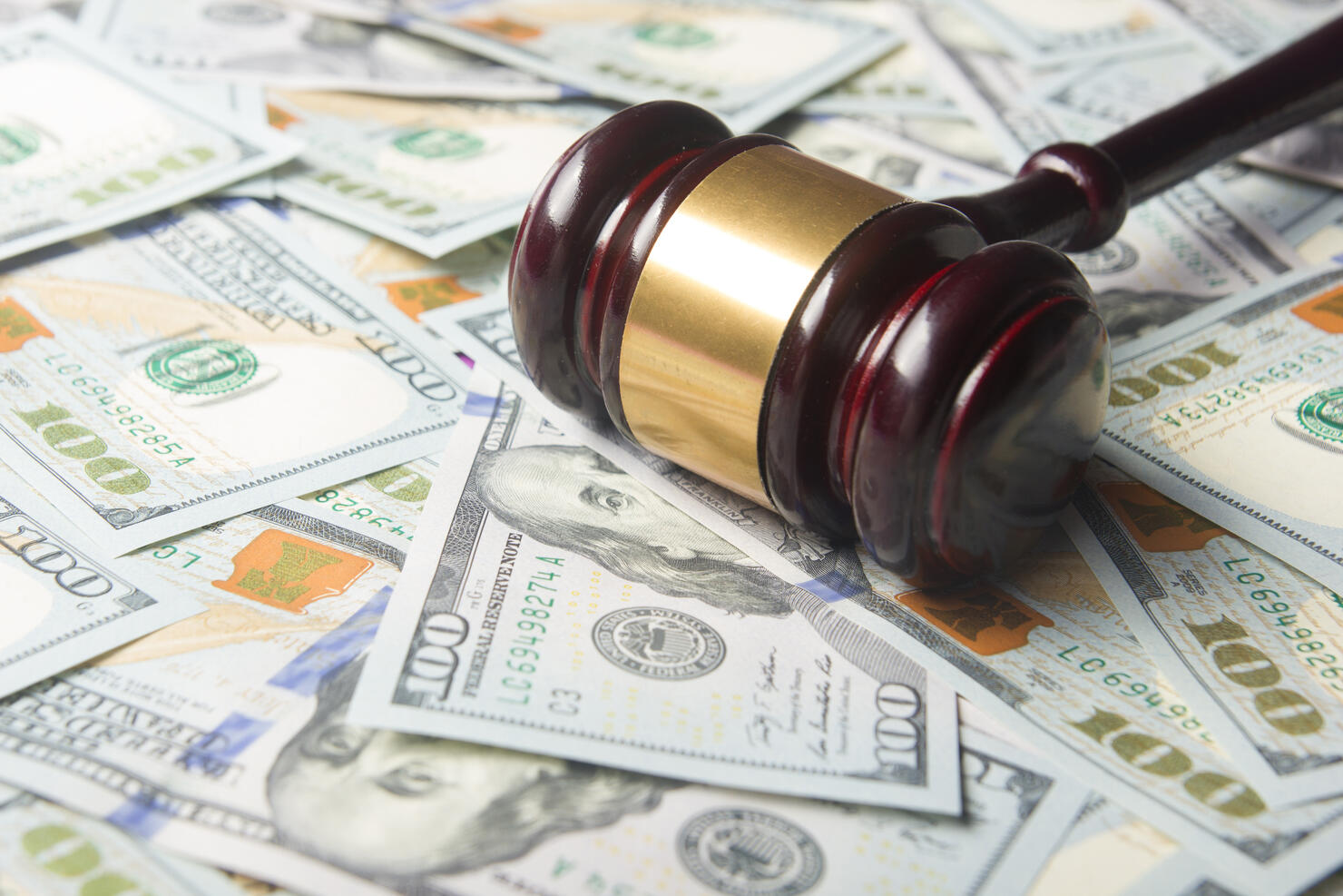 Judges Or Auctioneer Gavel On The Dollar Cash Background, Top View, Close-Up. Concept For Corruption, Bankruptcy, Bail, Crime, Bribing, Fraud, Auction Bidding, Fines