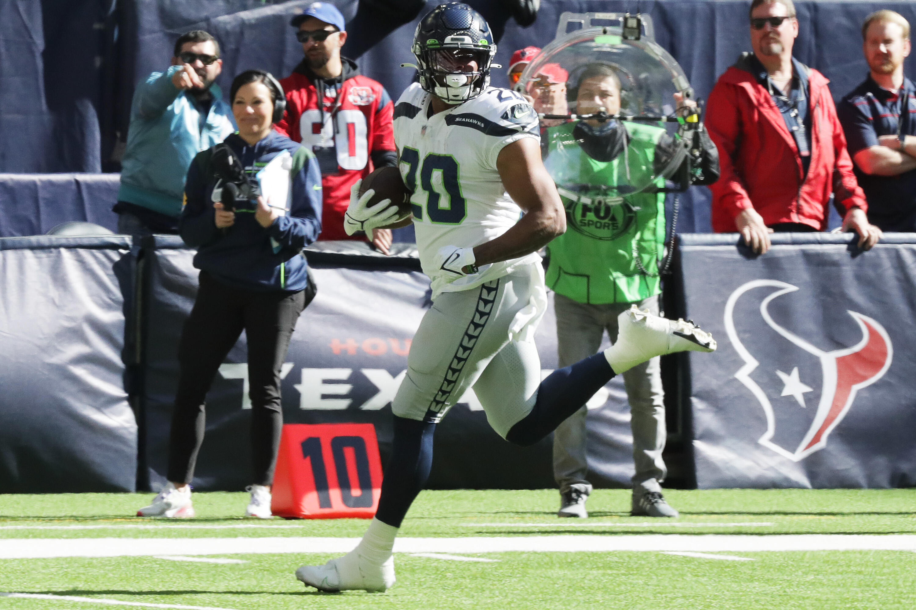 Seahawks, Penny run over Texans, 33-13.