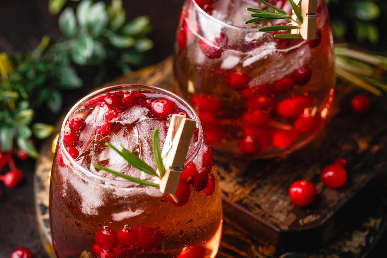 Festive Cranberry and rosemary cocktail with ice. Alcoholic or non-alcoholic cocktail