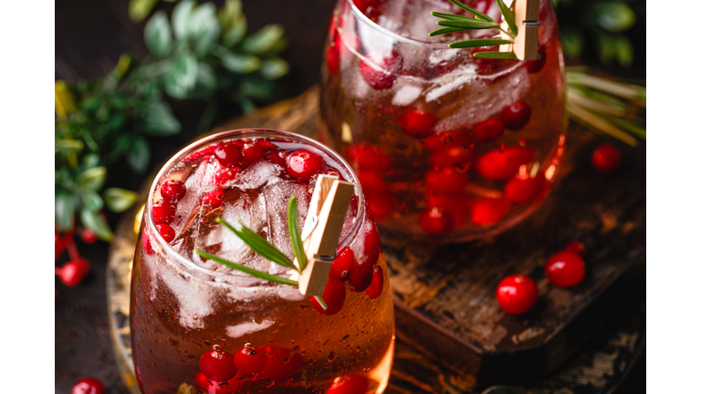 Festive Cranberry and rosemary cocktail with ice. Alcoholic or non-alcoholic cocktail