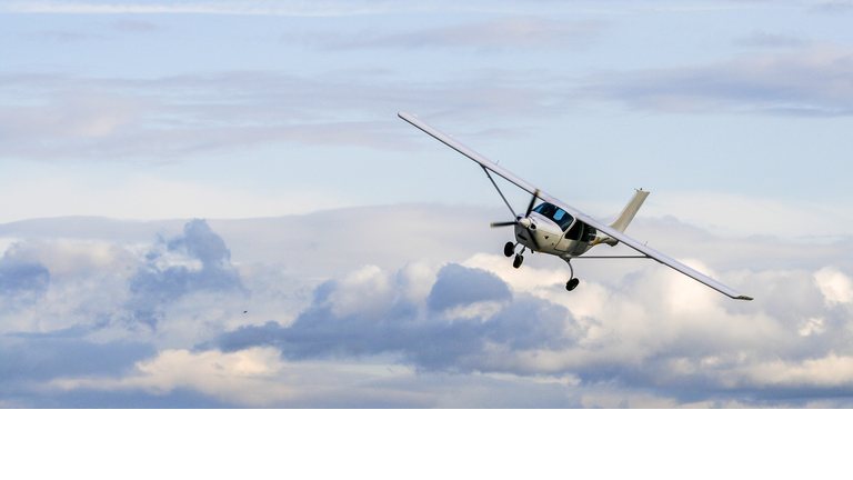 Propeller plane flying