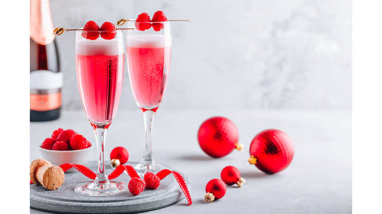 Pink Raspberry Mimosa Cocktail with champagne or prosecco