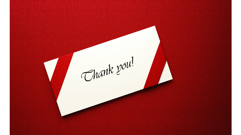 White Thank You Note on Red Background