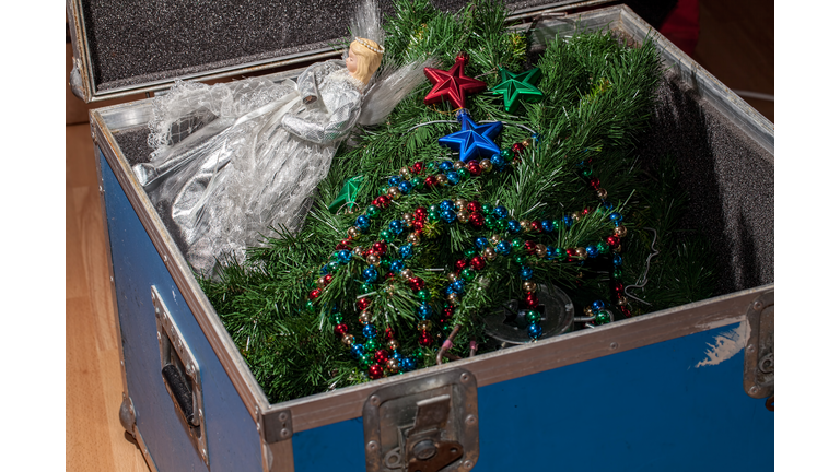 Christmas tree decorations taken down and packed away in storage.