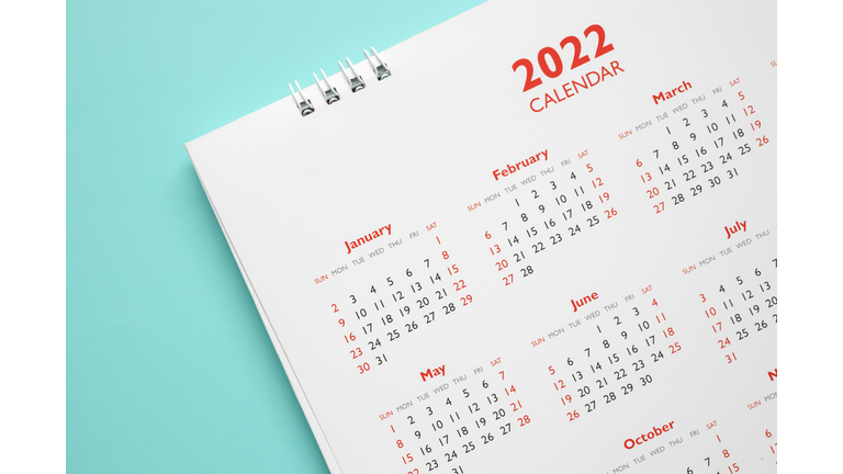 2022 calendar page on blue background business planning appointment meeting concept