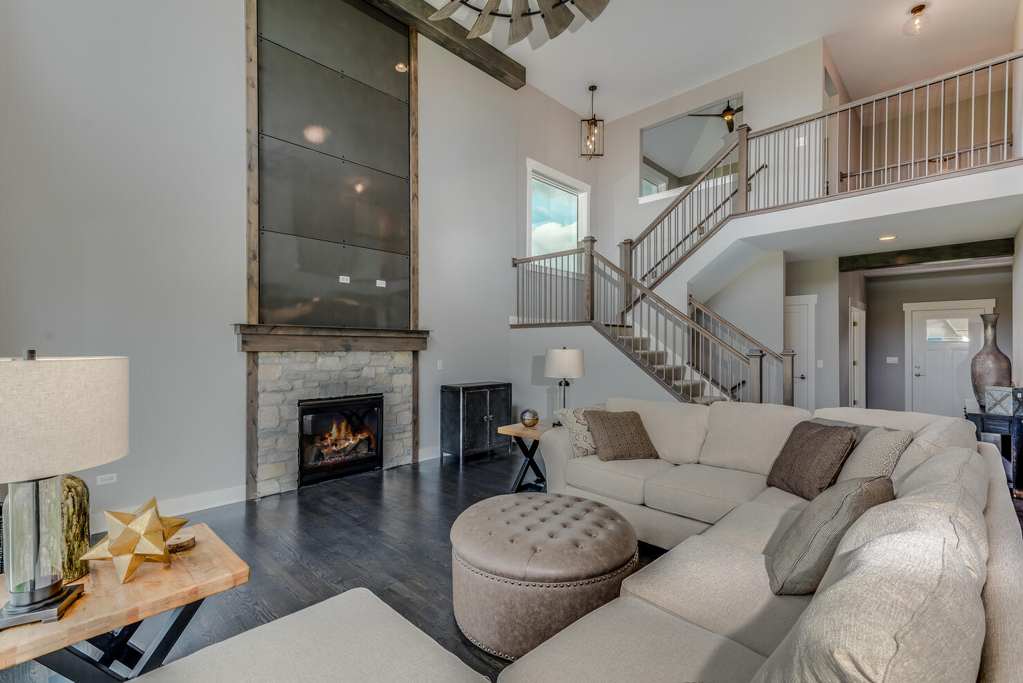 Two story great room with modern fireplace