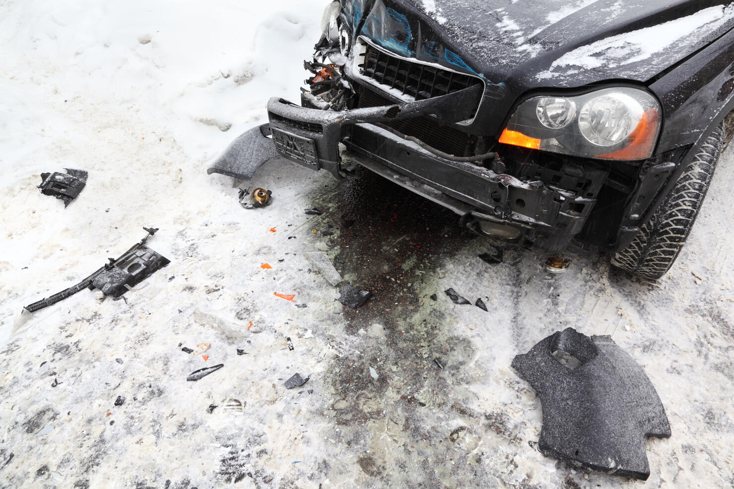 Broken car on road in winter; crash accident