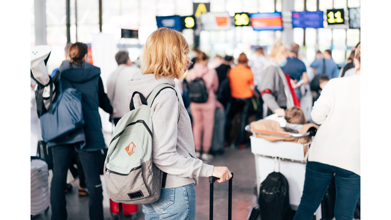 check-in queue at the airport