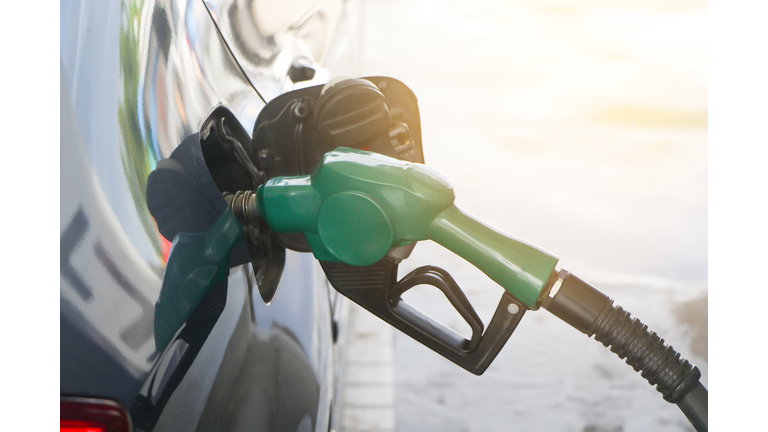 Petroleum Gas station. Fuel pump colorful petrol pump filling nozzles.car at gas station being filled with fuel