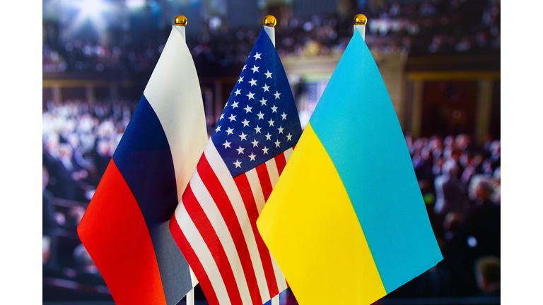 The US flag, Russian flag, Ukraine flag. Flag of USA, flag of Russia, flag of Ukraine. The United States of America and the Russian Federation confrontation. Russia's invasion of Ukraine