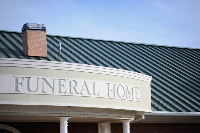 Funeral home sign on building