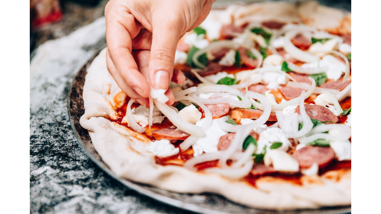 Preparing pizza