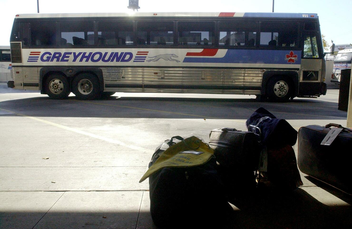 An empty Greyhound bus pulls into the Greyhound Bu
