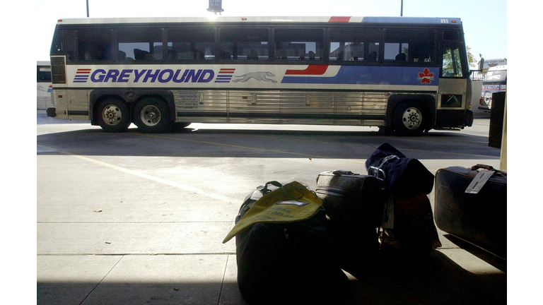 An empty Greyhound bus pulls into the Greyhound Bu