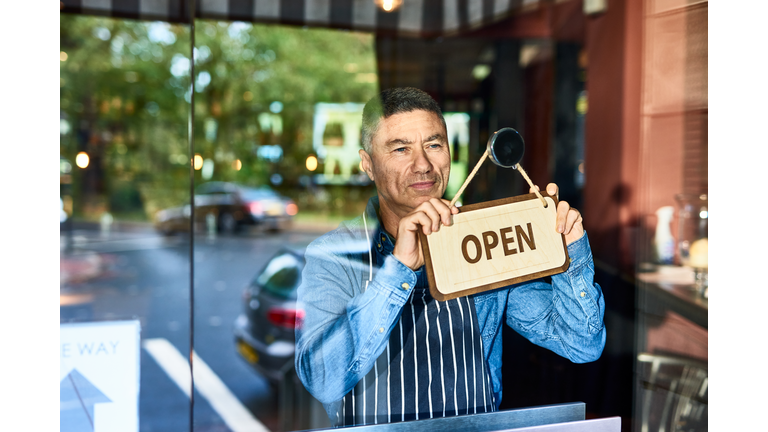 Small business owner opening restaurant