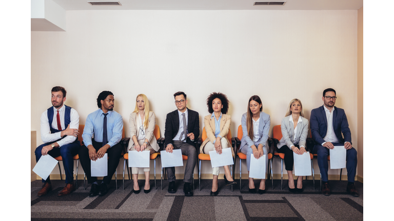 Photo of candidates waiting for a job interview.