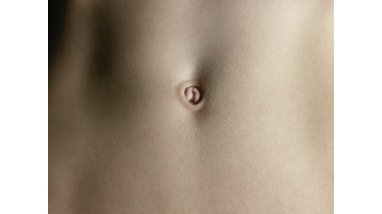 Woman's stomach, mid section