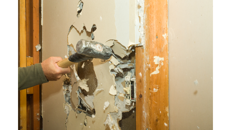 Renovating Wall, Removing Drywall with a Sledgehammer