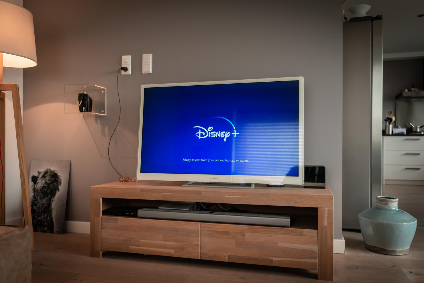 Disney+ startscreen on tv. Disney+ online video, content streaming subscription service. Disney plus, Star wars, Marvel, Pixar, National Geographic.