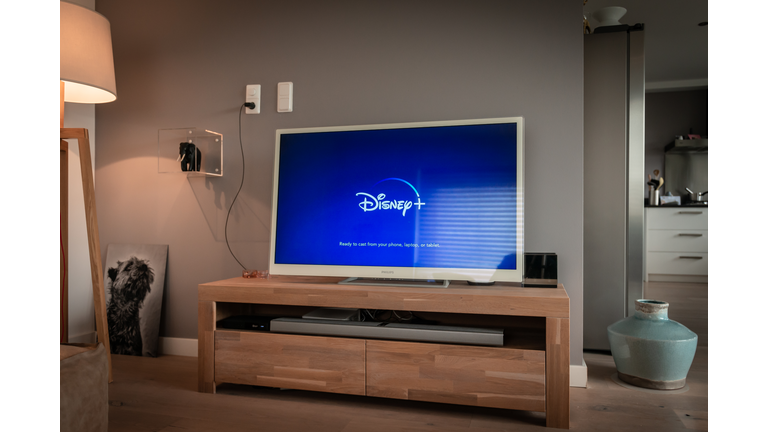 Disney+ startscreen on tv. Disney+ online video, content streaming subscription service. Disney plus, Star wars, Marvel, Pixar, National Geographic.