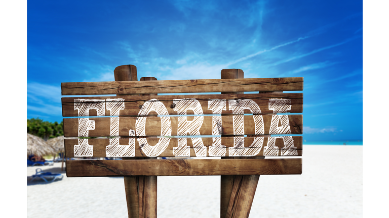 Florida wooden sign on the beach