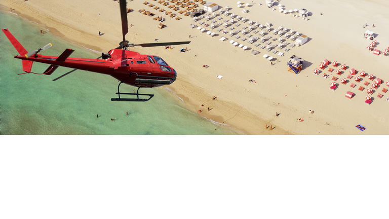 Helicopter flying over Miami Beach, Florida, USA.