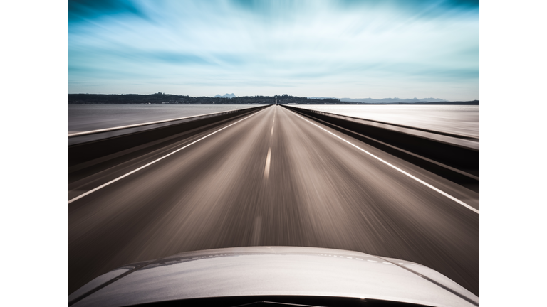 View from top of a car speeding along a bridge, Megler, Washington, America, USA 