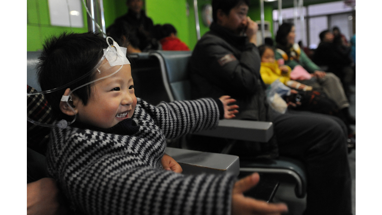 A group of Chinese children accompanied