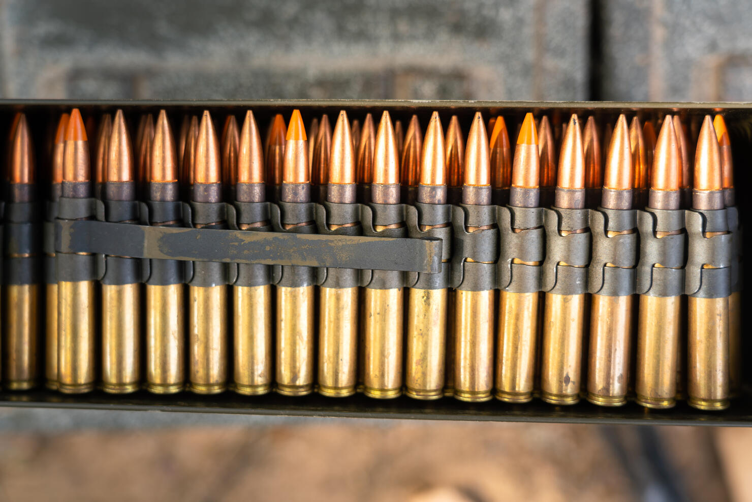 Row of heavy machine gun bullets.