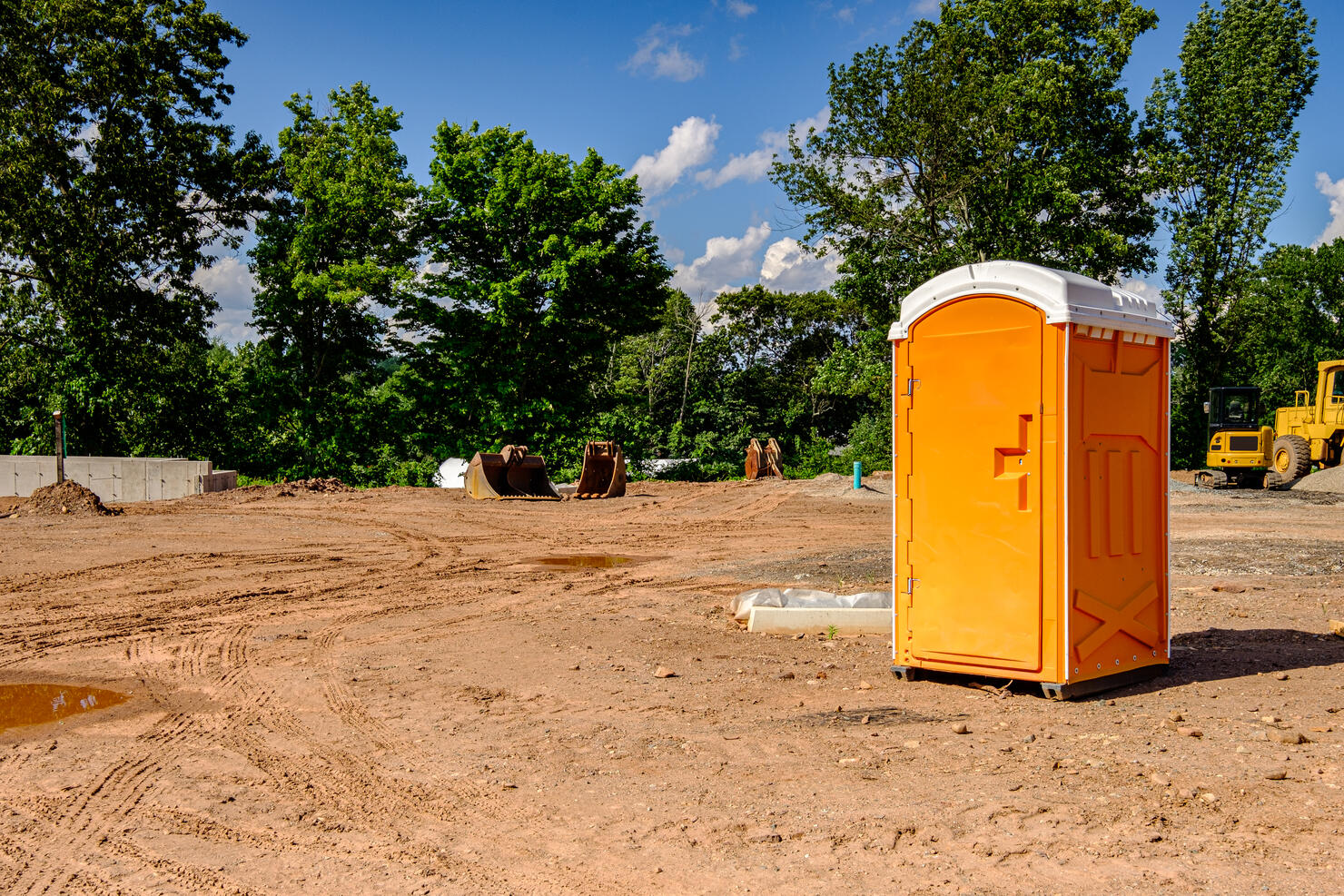 Construction site with port-a-potty