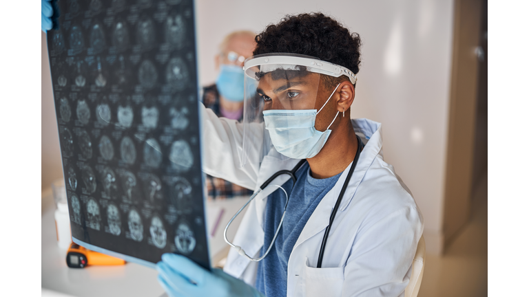 Neurologist staring at the patient brain images