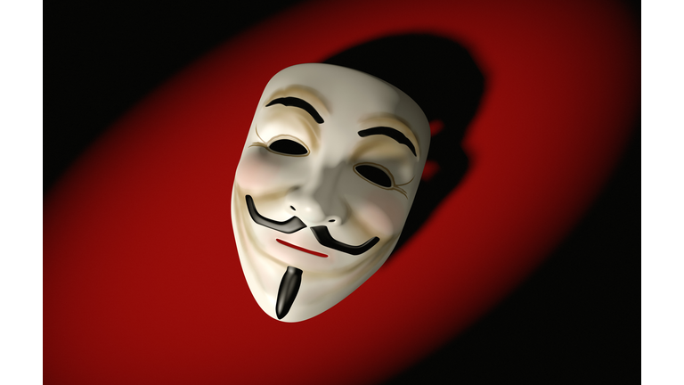 Mask of Guy Fawkes on red