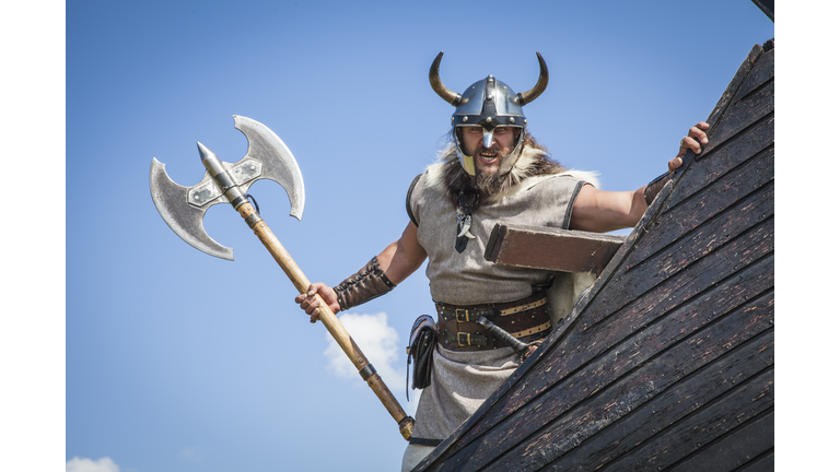 Strong angry Viking on his ship