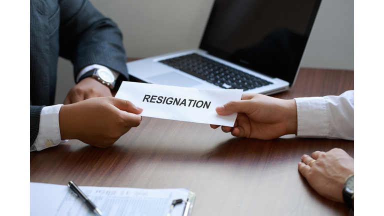 Hand of employer get a resignation letter from an employee. letter of resignation, Quitting a job, The big quit.The great Resignation.Resignation concept.