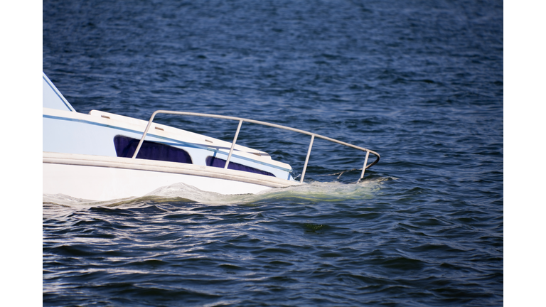 Sinking yacht bow in beautiful ocean water