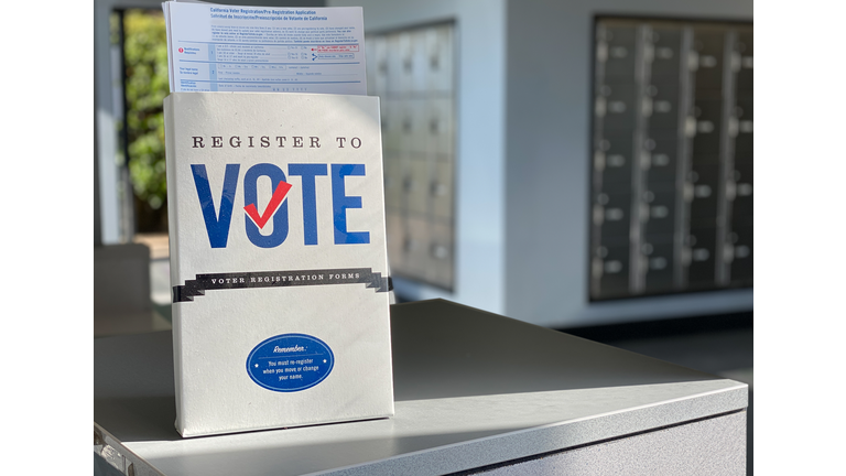 Register to vote application display in Post Office